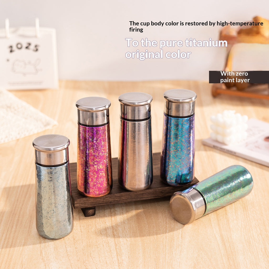 Portable mini ceramic-lined insulated travel cup in titanium stainless steel, available in 150ml to 300ml sizes, ideal for hot and cold drinks on the go